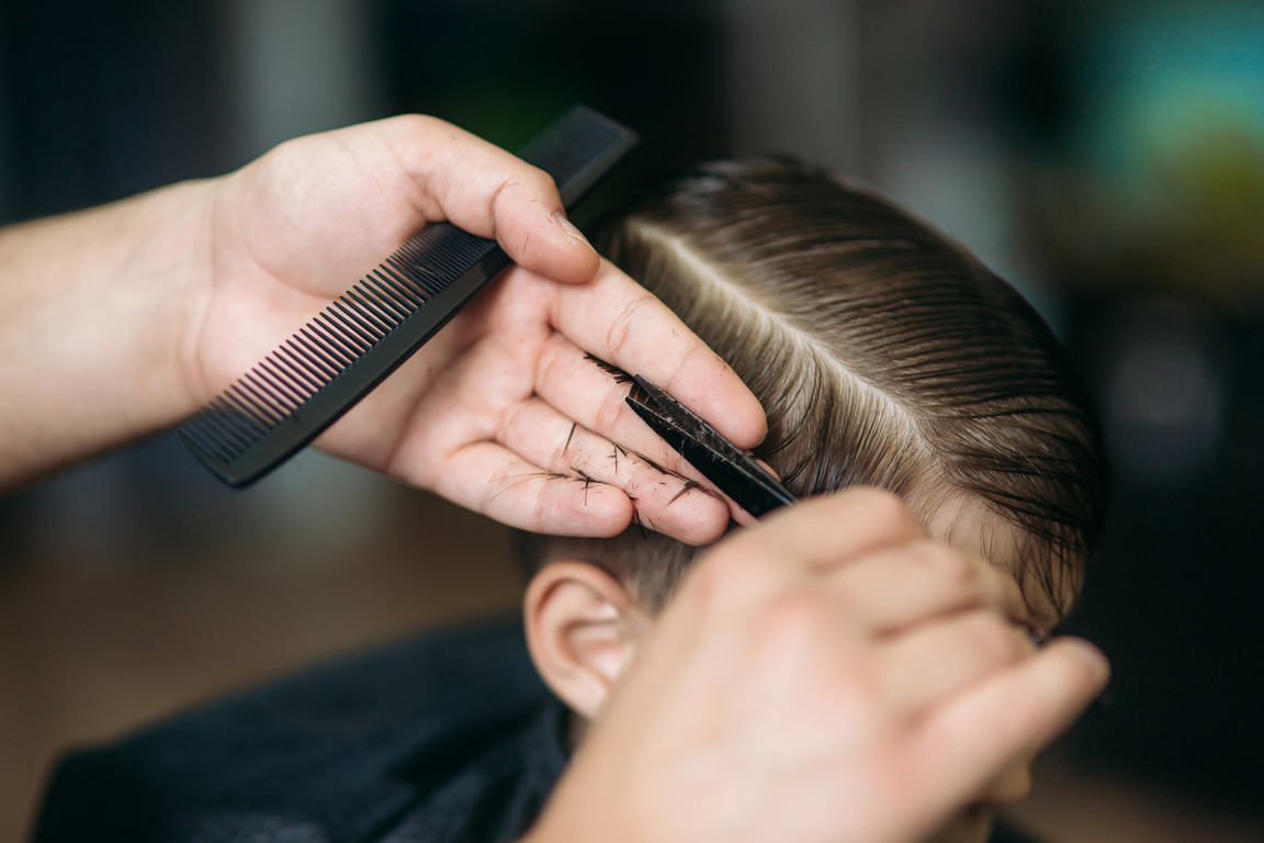 Little Boy at Barber's Getting Haircut